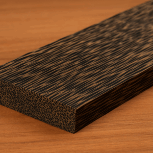 Black Palm lumber board showing dark streaked grain with golden-brown highlights, finely milled for premium woodworking.