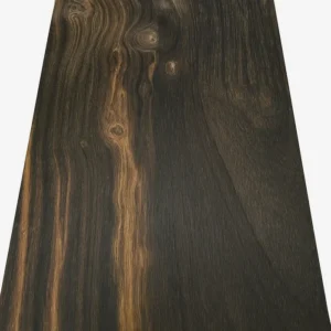 Close-up of a Brazilian Blackheart (Pau Santo) hardwood board with dark black-brown grain and lighter golden streaks from G&H Hardwoods.